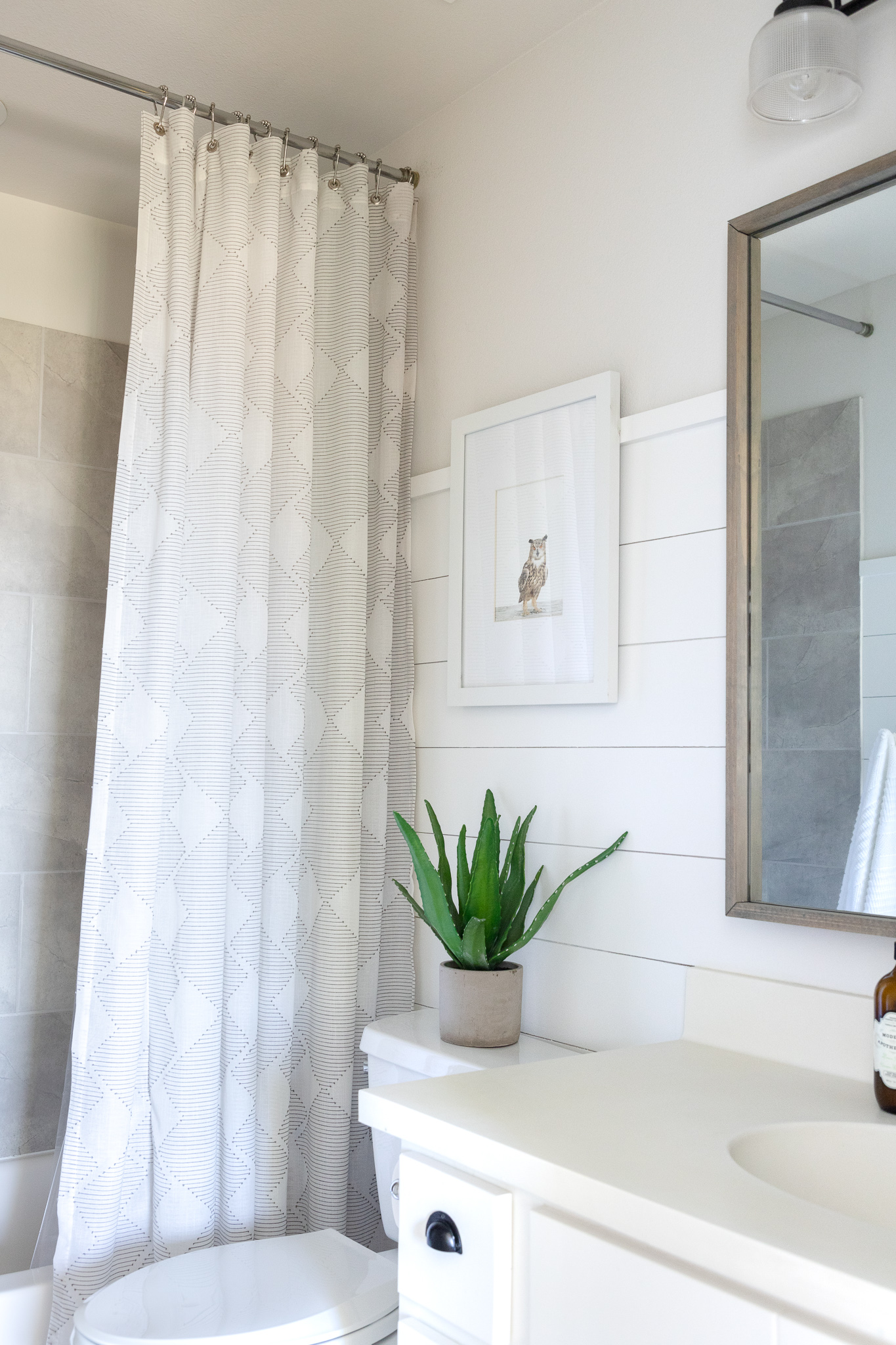 DIY shower curtain from window drapes