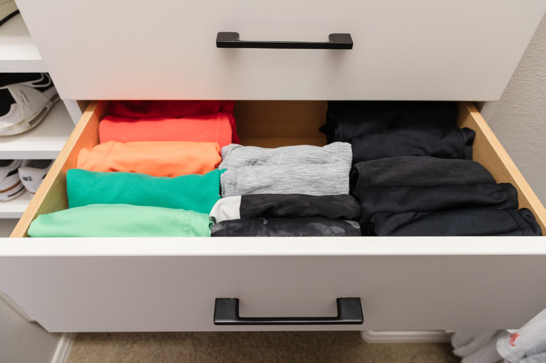 closet drawer organization, kid's shorts folded in drawer